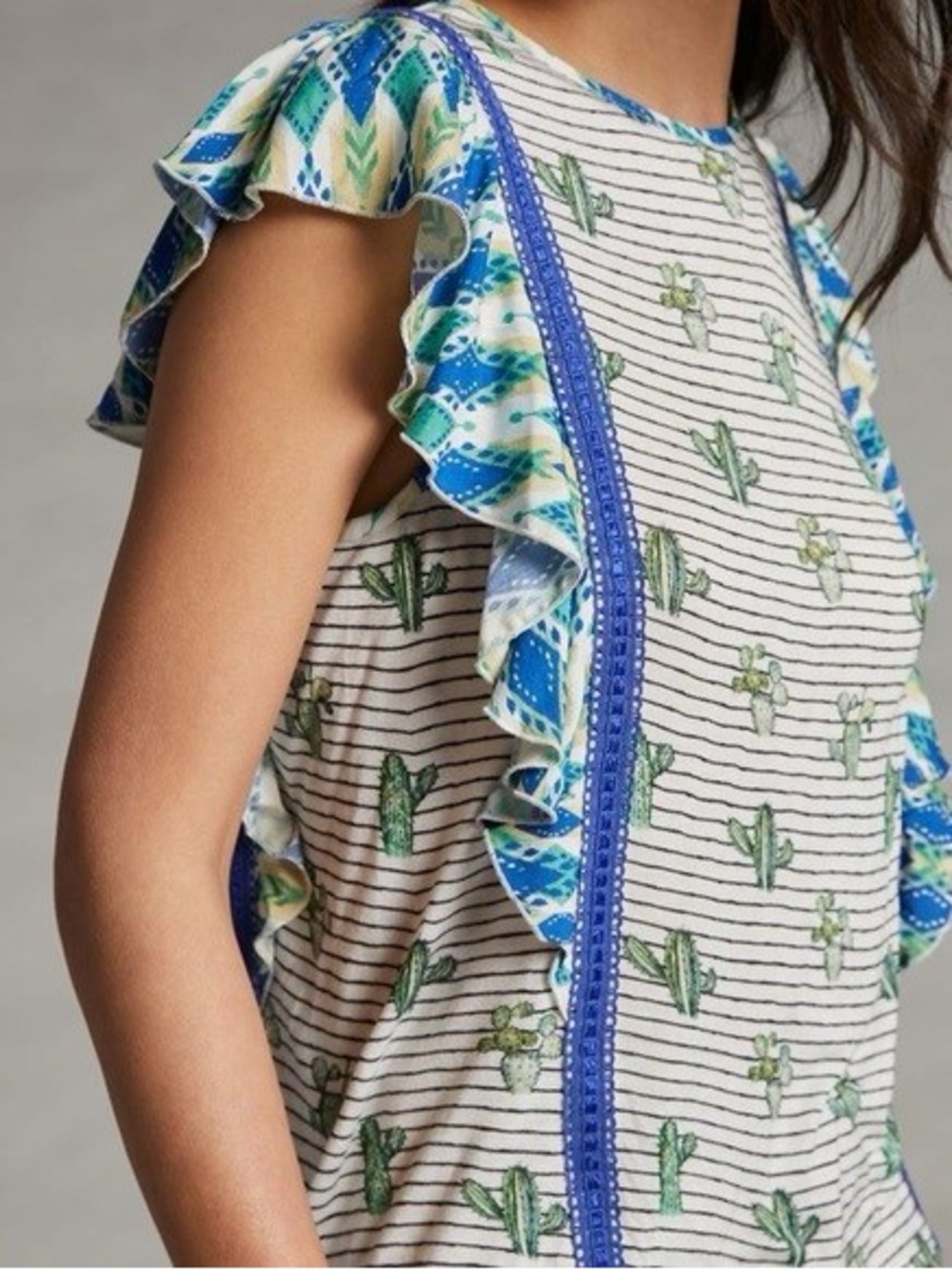 Anthropologie - conditions apply.Cactus Print Ruffle Sleeve Tank with Blue Trim